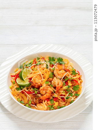 pad thai with shrimps, peanuts, eggs, bean sprouts pad thai with shrimps, peanuts, eggs, bean sprouts 113072479