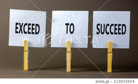 Exceed to succeed symbol. Concept words Exceed to succeed on beautiful white paper on clothespin. Beautiful grey table grey background. Business and exceed to succeed concept. Copy space. Exceed to succeed symbol. Concept words Exceed to succeed on beautiful white paper on clothespin. Beautiful grey table grey background. Business and exceed to succeed concept. Copy space. 113072654