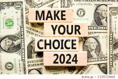 Make your choice 2024 symbol. Concept words Make your choice 2024 on beautiful wooden block. Beautiful dollar bills background. Dollar bills. Business Make your choice 2024 concept. Copy space. Make your choice 2024 symbol. Concept words Make your choice 2024 on beautiful wooden block. Beautiful dollar bills background. Dollar bills. Business Make your choice 2024 concept. Copy space. 113072668
