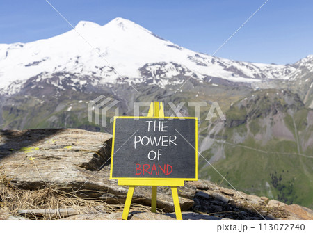 The power of brand symbol. Concept words The power of brand on beautiful black chalk blackboard. Beautiful mountain Elbrus background. Business the power of brand concept. Copy space. 113072740