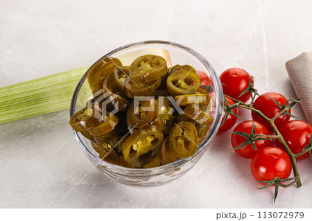 Sliced canned jalapeno pepper Sliced canned jalapeno pepper 113072979