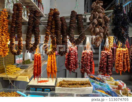 Peeled Georgian nuts. Background of nuts without shells. Snack on the table. Squirrel food. Lots of nuts. Hearty ingredient. Choice of ingredients for cooking. Bundles of figs Peeled Georgian nuts. Background of nuts without shells. Snack on the table. Squirrel food. Lots of nuts. Hearty ingredient. Choice of ingredients for cooking. Bundles of figs 113074705