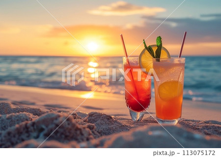 Cocktails on the beach at sunset time. 113075172