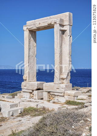 Remains of Portara gate of the Temple of Apollo at Naxos island in the Cyclades Greece Remains of Portara gate of the Temple of Apollo at Naxos island in the Cyclades Greece 113075829