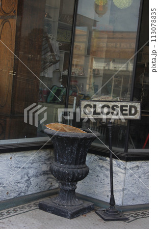 Closed Sign On Historic Downtown Building in Rural East Texas 113078835