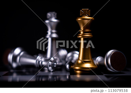 Golden and Silver King chess is last standing in the chess board, Concept of successful business leadership, Confrontation and loss 113079538