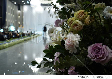 Wedding flower decoration in the interior of the banquet hall. 113082989