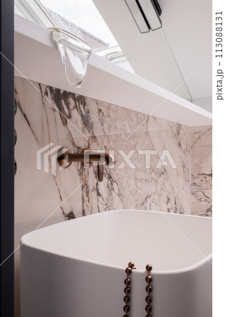 Building Property with White Marble Wall, Copper Faucet, and Sink Fixture Building Property with White Marble Wall, Copper Faucet, and Sink Fixture 113088131