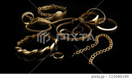 Assorted Gold Jewelry on Black Assorted Gold Jewelry on Black 113090199