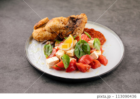 Cooked gherkin chicken with vegetables Cooked gherkin chicken with vegetables 113090436