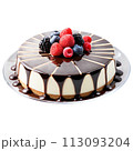cheesecake in a round, clear glass dish, topped with fresh berries 113093204