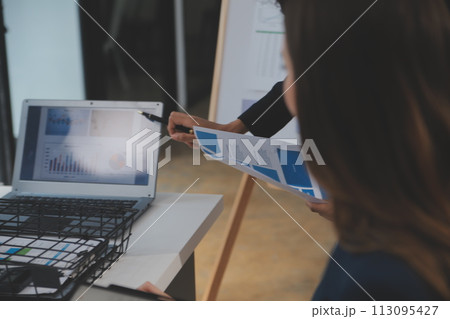 Close up ux developer and ui designer use augmented reality brainstorming about mobile app interface wireframe design on desk at modern office.Creative digital development agency 113095427