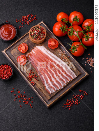 Fresh raw bacon sliced with spices and herbs 113095572