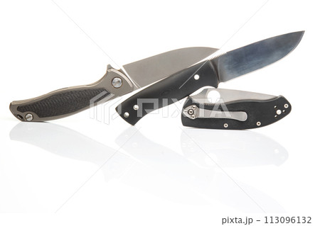 three different folding knives on a white background. item for tourism and survival 113096132