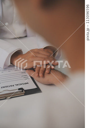 Homecare nursing service and elderly people cardiology healthcare. Close up of young hispanic female doctor nurse check mature caucasian man patient heartbeat using stethoscope during visit 113096596