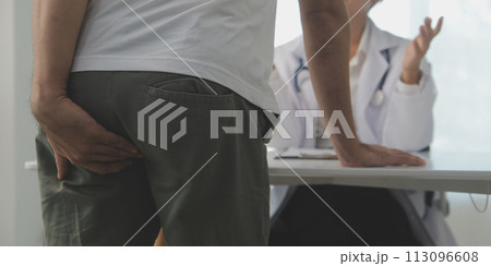 Male hand holding her bottom because having abdominal pain and hemorrhoids, health care, constipation, Anatomical, suffering from pain, abdominal, bowel problem, bloody diarrhea, stomach ache, cancer 113096608