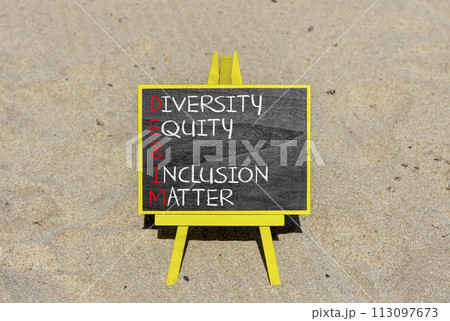 DEI Diversity equity inclusion matter symbol. Concept words DEI diversity equity and inclusion matter on blackboard. Beautiful sand background. Business diversity equity inclusion matter concept DEI Diversity equity inclusion matter symbol. Concept words DEI diversity equity and inclusion matter on blackboard. Beautiful sand background. Business diversity equity inclusion matter concept 113097673