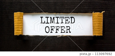 Limited offer symbol. Concept words Limited offer on beautiful white paper. Beautiful black table black background. Business marketing, motivational Limited offer concept. Copy space. 113097692
