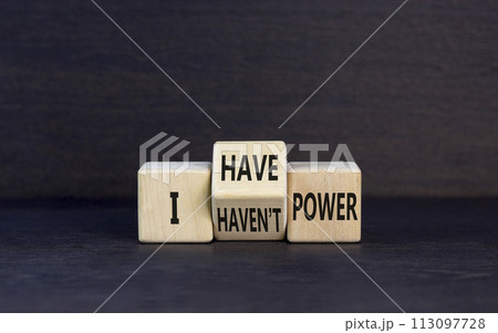 I have or not power symbol. Concept word I have or have not power on beautiful wooden cubes. Beautiful black table black background. Business and i have or not power concept. Copy space. 113097728