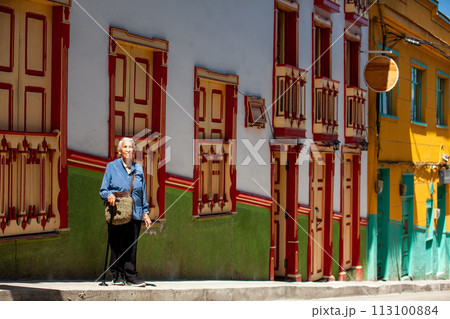 Senior woman tourist at the beautiful heritage town of Salamina in the department of Caldas in Colombia 113100884