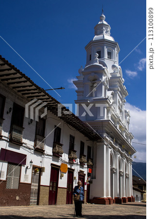 Senior woman tourist at the beautiful heritage town of Salamina in the department of Caldas in Colombia 113100899
