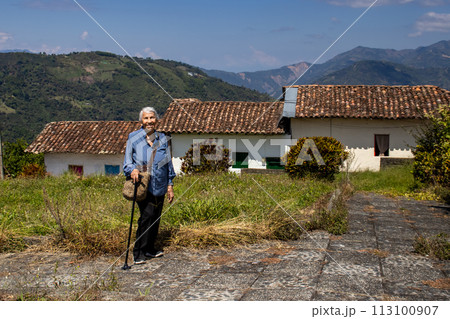 Senior woman tourist at the beautiful heritage town of Salamina in the department of Caldas in Colombia 113100907