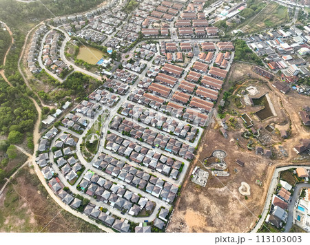 New development real estate. Aerial view of residential houses and driveways neighborhood New development real estate. Aerial view of residential houses and driveways neighborhood 113103003