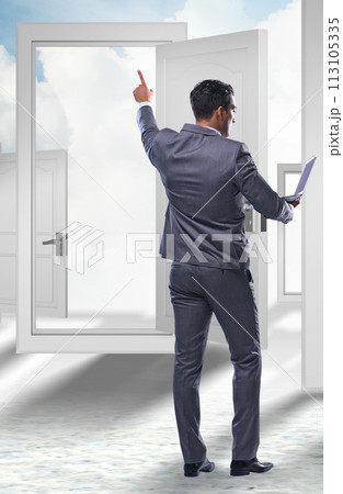 Businessman facing many business opportunities Businessman facing many business opportunities 113105335