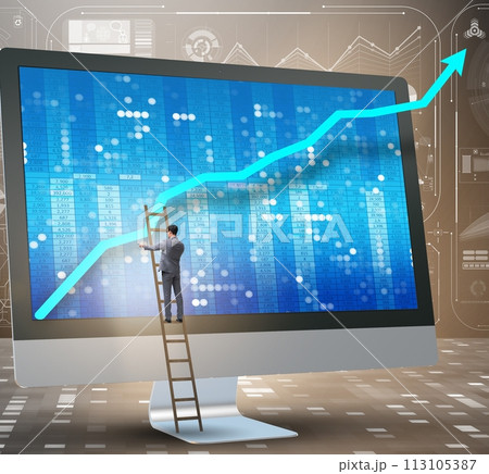 Businessman in economic forecasting concept with charts 113105387