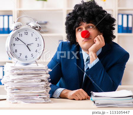 Young clown businessman working in the office 113105447