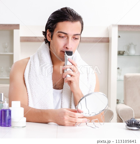 Young handsome man in the bathroom 113105641