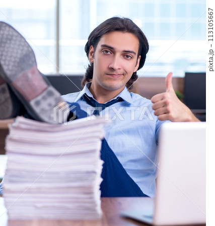 Young employee unhappy with excessive work 113105667