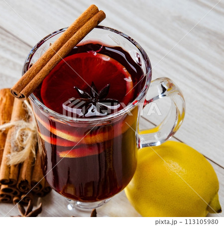 Mulled wine glintwine served in glasses for christmas table 113105980