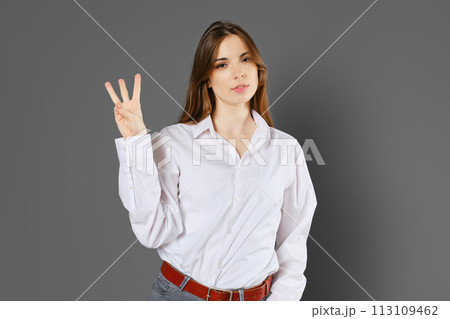 Smart woman shows three fingers 113109462