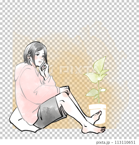 床に座ってスマホで話している女性 113110651