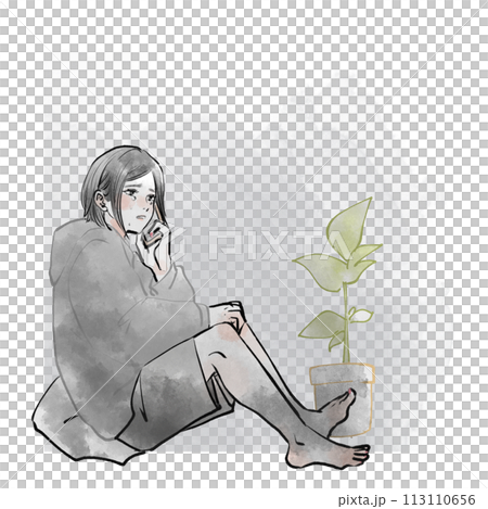 Woman sitting on the floor and talking on a smartphone Woman sitting on the floor and talking on a smartphone 113110656