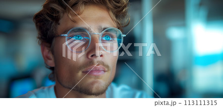 Close-up of a student in glasses looking attentively at the monitor, programming and analysis courses in a modern futuristic computerized university classroom, space for a concept about education Close-up of a student in glasses looking attentively at the monitor, programming and analysis courses in a modern futuristic computerized university classroom, space for a concept about education 113111315