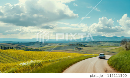 Travel poster, a family driving a crossover SUV drives along a spring road in Tuscany, the road passes through low hills, a patchwork of flowering fields and vineyards stretching to the horizon. Travel poster, a family driving a crossover SUV drives along a spring road in Tuscany, the road passes through low hills, a patchwork of flowering fields and vineyards stretching to the horizon. 113111590