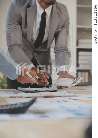 Finance manager meeting discussing company growth project success financial statistics, professional investor working start up project for strategy plan with document, laptop and digital tablet. 113112166