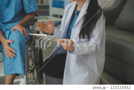 young asian physical therapist working with senior woman on walking with a walker young asian physical therapist working with senior woman on walking with a walker 113115852