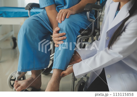 young asian physical therapist working with senior woman on walking with a walker young asian physical therapist working with senior woman on walking with a walker 113115858