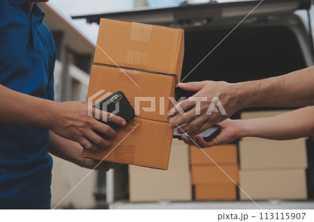 Asian delivery express courier young man use giving boxes to woman customer he wearing protective face mask at front home Asian delivery express courier young man use giving boxes to woman customer he wearing protective face mask at front home 113115907