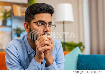 Thoughtful Indian man suffers from unfair situation break up depressed feeling bad annoyed burnout 113116145