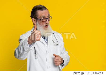 Doctor man raises thumbs up agrees or gives positive reply recommends advertisement likes good idea 113116241