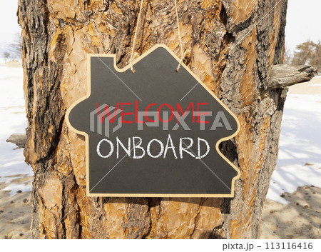 Welcome onboard symbol. Concept words Welcome onboard on beautiful black house blackboard. Beautiful tree background. Business, motivational welcome onboard concept. Copy space. Welcome onboard symbol. Concept words Welcome onboard on beautiful black house blackboard. Beautiful tree background. Business, motivational welcome onboard concept. Copy space. 113116416