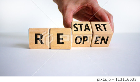Reopen and restart symbol. Businessman hand turns cubes and changes the word 'reopen' to 'restart'. Beautiful white background. Business and reopen - restart concept. Copy space. Reopen and restart symbol. Businessman hand turns cubes and changes the word 'reopen' to 'restart'. Beautiful white background. Business and reopen - restart concept. Copy space. 113116635