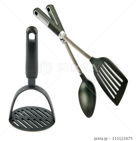 Kitchen spatula, spoon and potato masher isolated on white. Collage. Kitchen spatula, spoon and potato masher isolated on white. Collage. 113122675