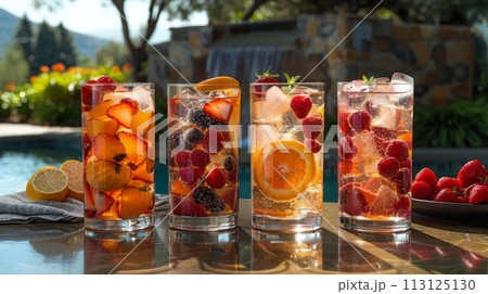 Four Glasses Filled With Different Types of Fruit 113125130