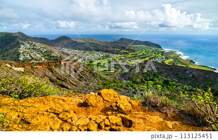View of Koko Crater from the summit of Koko Head Stairs trail. Oahu island in Hawaii, United States View of Koko Crater from the summit of Koko Head Stairs trail. Oahu island in Hawaii, United States 113125451