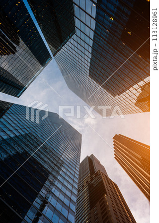 tall skyscrapers buildings looking up perspective, modern architecture of steel and glass, skyline of big city 113128961